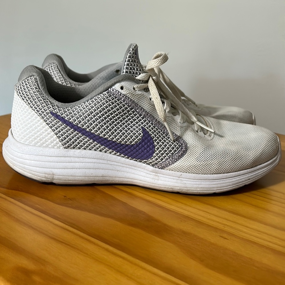 Nike Women’s Revolution. White with lavender swoosh.